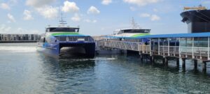 Two San Francisco Bay Ferry vessels docked in Oakland.